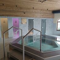 účastník zážitku na Wellness pobytu v pivním hotelu s pípou na pokoji